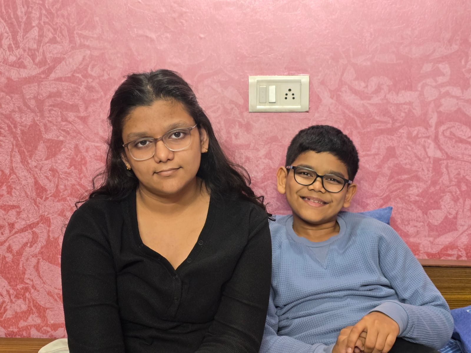 About Us Ishi and Anwit musical duo performing together — guitarist and young keyboard musician creating soulful harmonies and collaborative music energy.