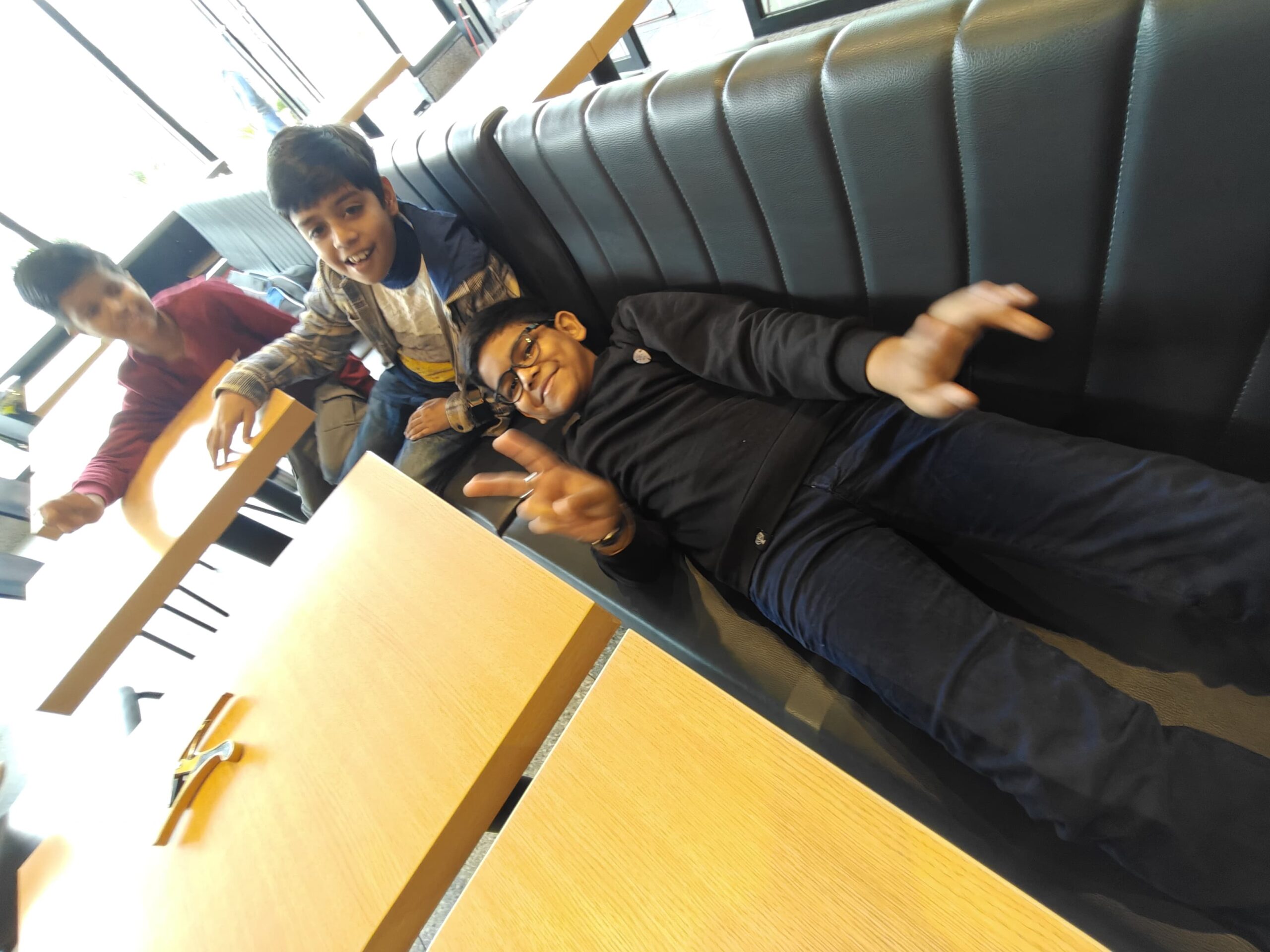 Young musician Anwit enjoying a playful moment with his friends