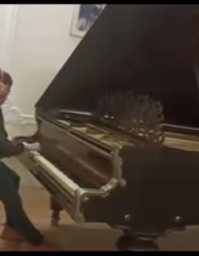 Anwit performing instrumental music on keyboard as part of a musician duo